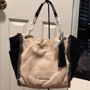 Michael Kors Chelsea Two-Tone Black and Cream Tote with black tassels